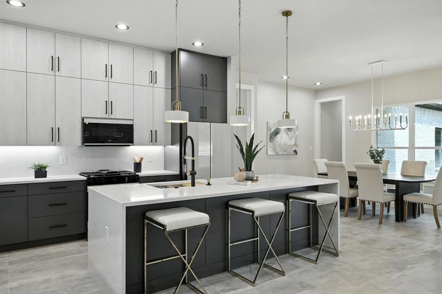 Kitchen with a breakfast bar, gray cabinets, decorative light fixtures, light stone countertops, and recessed lighting