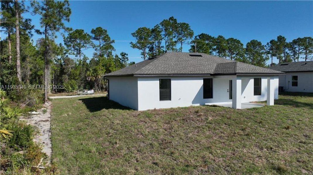 Exterior details and patio area of a home in , Lehigh Acres (Image 18).