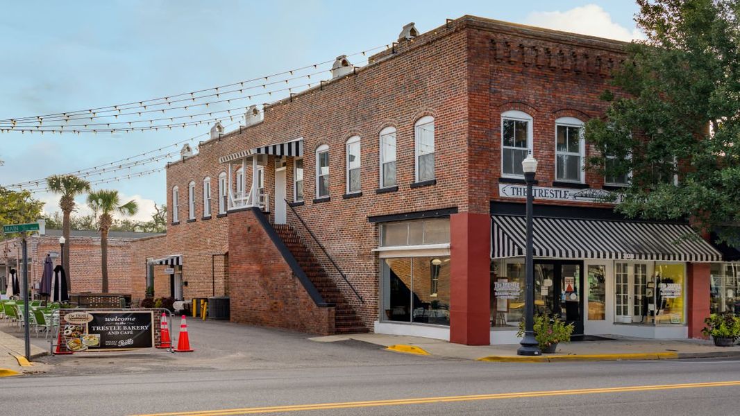Front exterior of a new home in Dove Crossing, Conway, SC, highlighting curb appeal (Image 13).