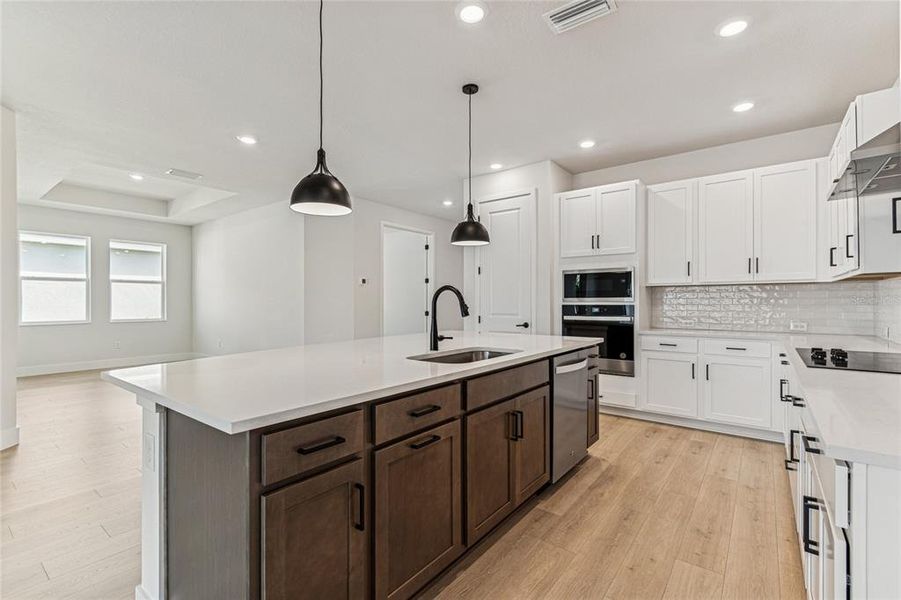 Furnished interior view inside a new home in North River Ranch - Cottage Series, Parrish (Image 19).