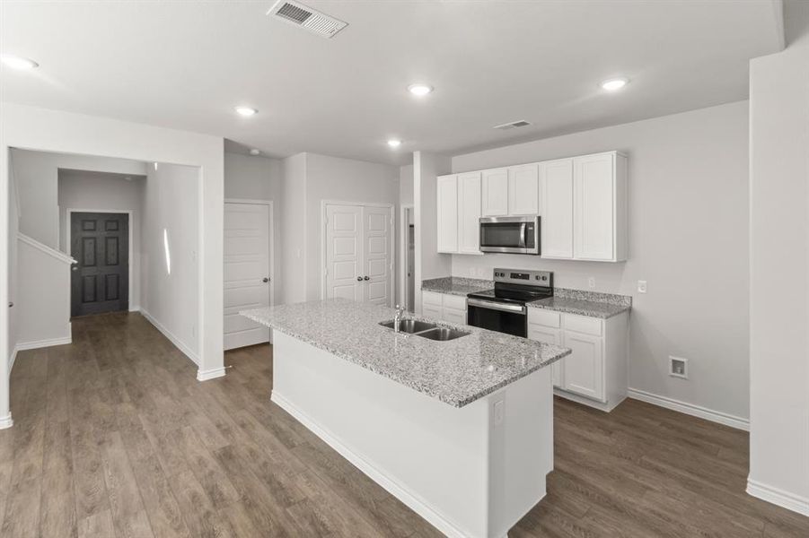 Furnished interior view inside a new home in Retreat at Fossil Creek, Fort Worth (Image 5). Furnished interior view inside a new home in Retreat at Fossil Creek, Fort Worth (Image 5).