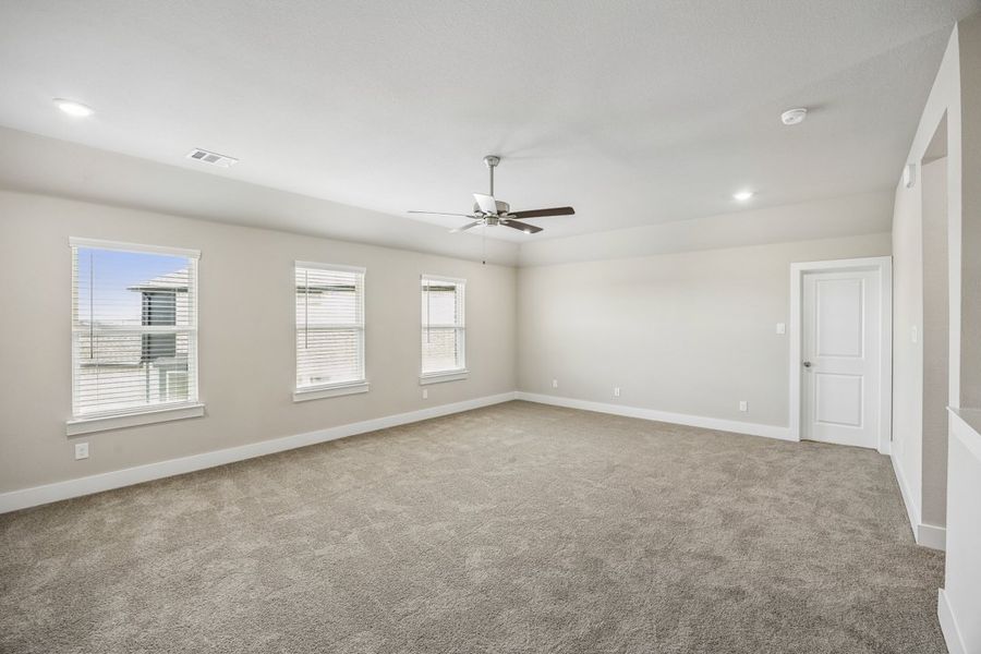Representative unfurnished interior of a home built from the The Mockingbird by Lillian Custom Homes in Polo Ridge, Forney (Image 42).