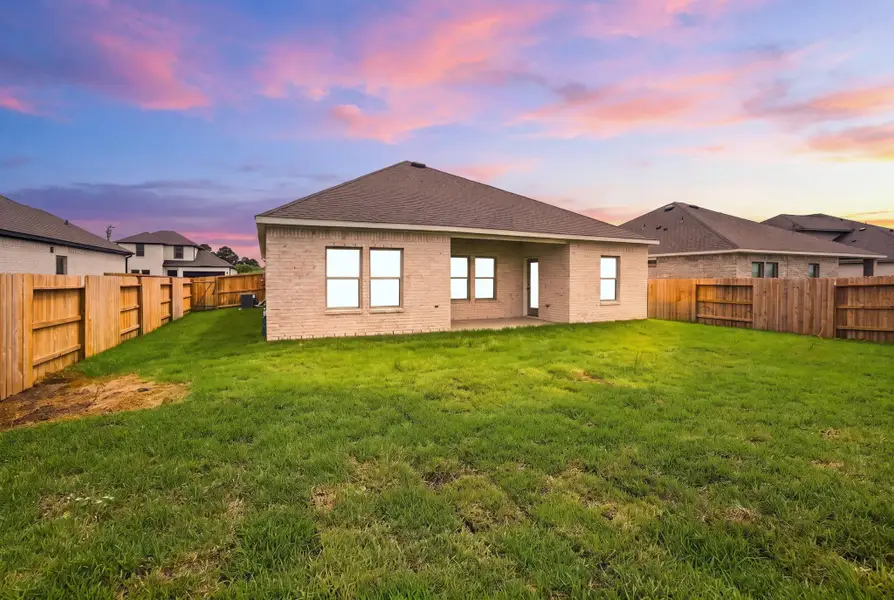 Exterior details and patio area of a home in Windcress, Cove (Image 4).