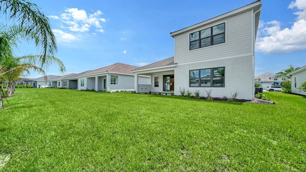 Exterior details and patio area of a home in Windward Real Estate and Homes for Sale in Sarasota, FL - Neal Communities, Lakewood Ranch (Image 28).