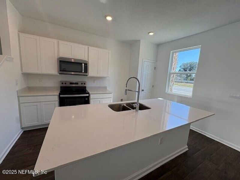 Furnished interior view inside a new home in Cordera Townhomes Express, St. Augustine (Image 4).