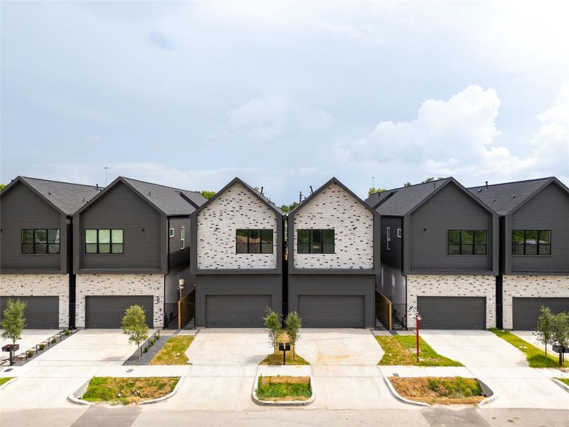 Front exterior of a new home in , Houston, TX, highlighting curb appeal (Image 24).