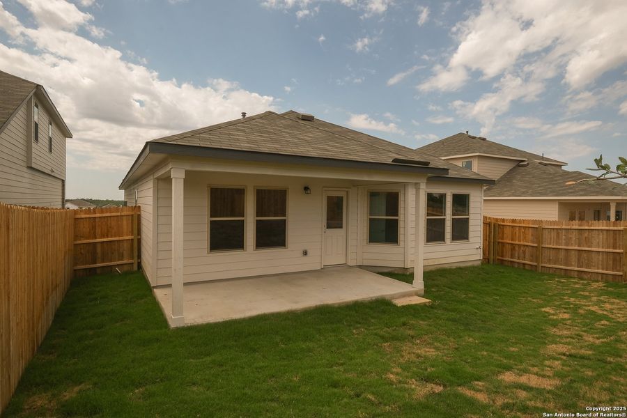 Front exterior of a new home in Hunters Ranch, San Antonio, TX, highlighting curb appeal (Image 20). Front exterior of a new home in Hunters Ranch, San Antonio, TX, highlighting curb appeal (Image 20).