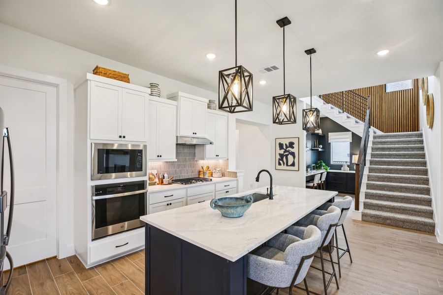 Furnished interior view inside a new home in Bridgeland, Cypress (Image 12).