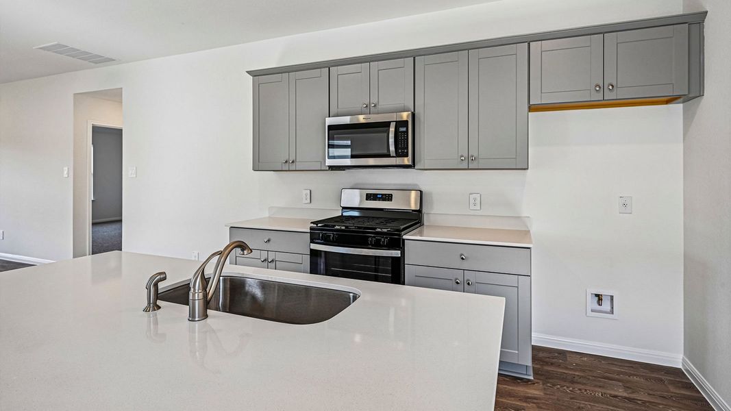 Furnished interior view inside a new home in Southgrove, Kyle (Image 9).