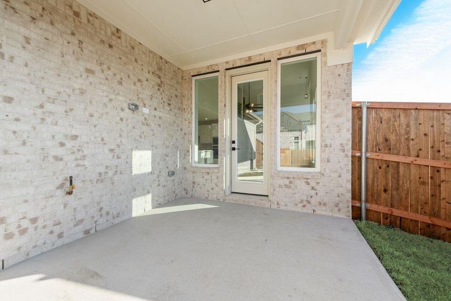 Exterior details and patio area of a home in Trails at Cottonwood Creek, Rowlett (Image 2). Exterior details and patio area of a home in Trails at Cottonwood Creek, Rowlett (Image 2).