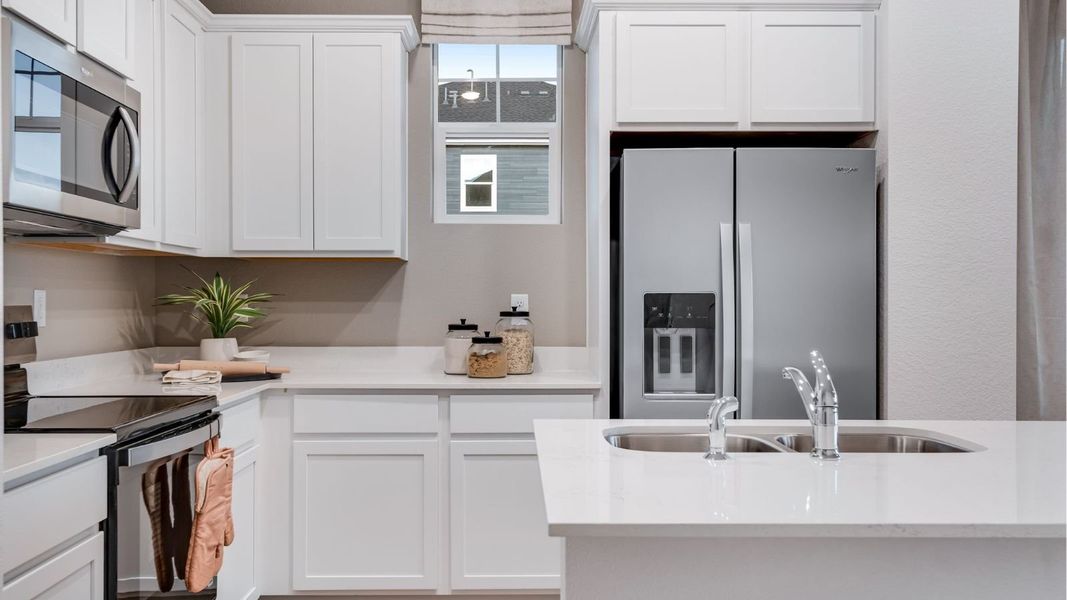 Furnished interior view inside a new home in Settlers Crossing, Commerce City (Image 9).