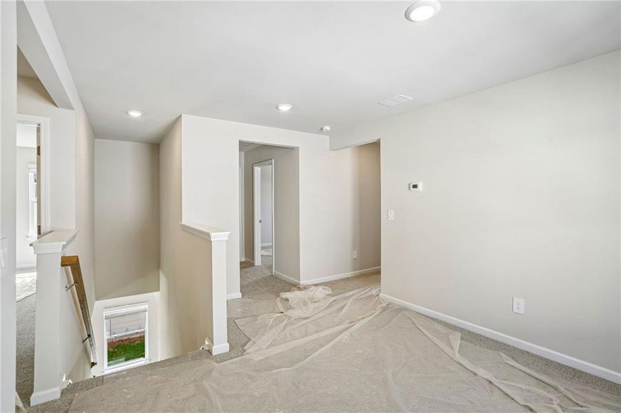 Spacious, unfurnished interior of a new home in Hawthorne Station, College Park (Image 38).