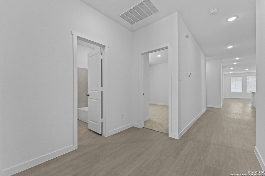 Spacious, unfurnished interior of a new home in Parkside: Coastline Collection, New Braunfels (Image 13).