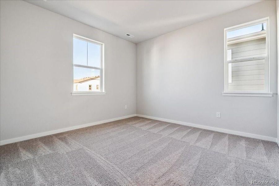 Spacious, unfurnished interior of a new home in Floret Collection at Alder Creek, Parker (Image 14). Spacious, unfurnished interior of a new home in Floret Collection at Alder Creek, Parker (Image 14).
