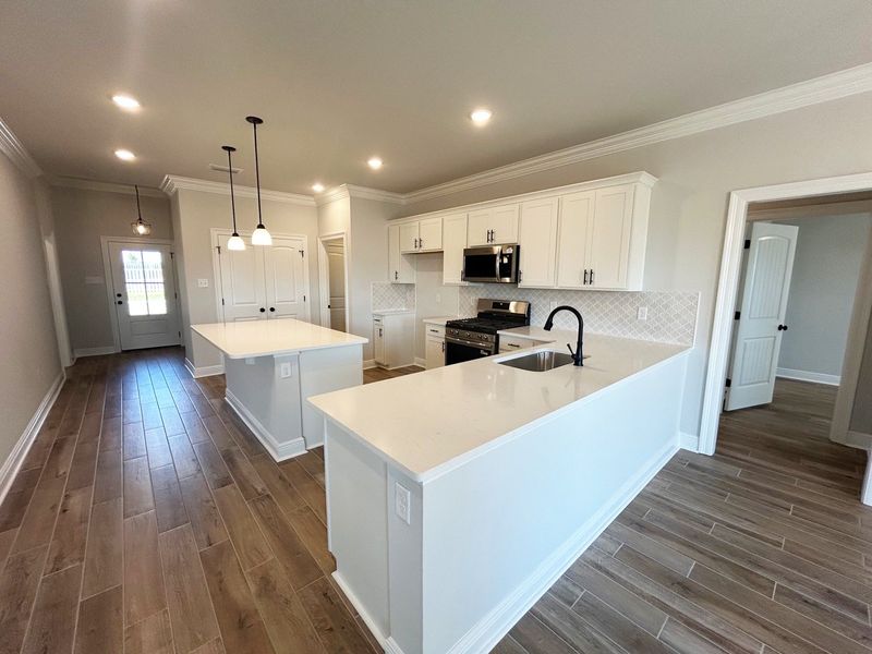 Furnished interior view inside a new home in The Bluffs at Lafayette, Freeport (Image 4).