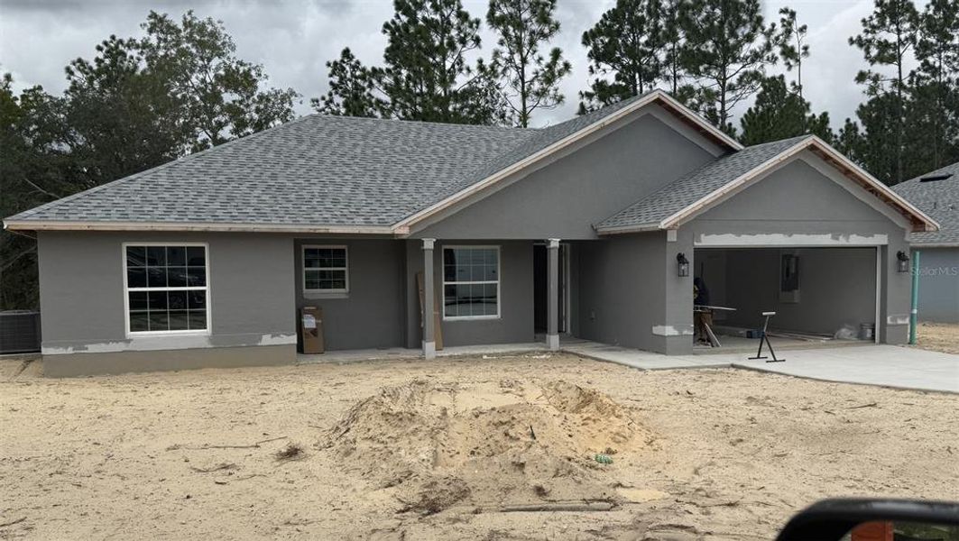 Front exterior of a new home in Citrus Springs Sub, Citrus Springs, FL, highlighting curb appeal (Image 1).