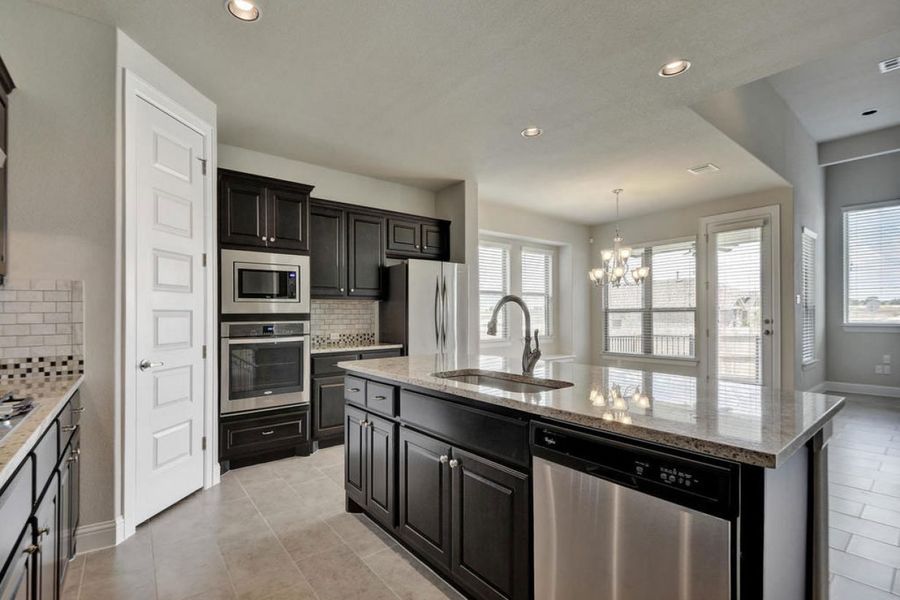 Representative furnished interior of a home built from the Oaks 2694 by Brohn Homes in Oaks at San Gabriel, Georgetown (Image 3).