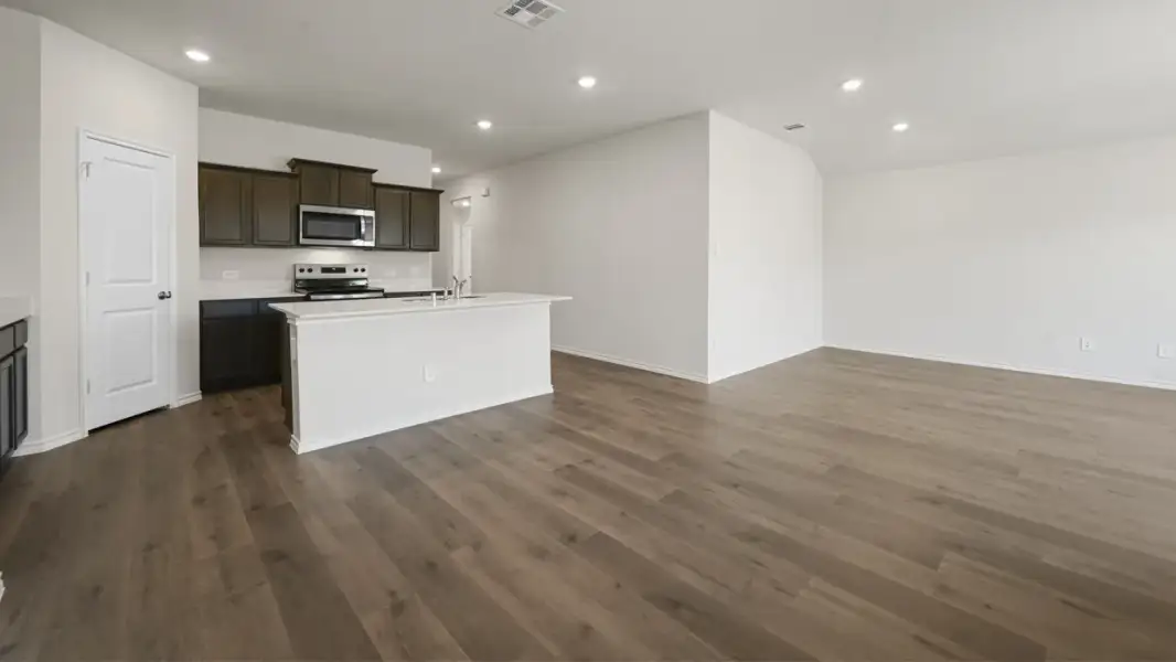 Representative unfurnished interior of a home built from the Denton by D.R. Horton in Asher Oaks, Bonham (Image 6).