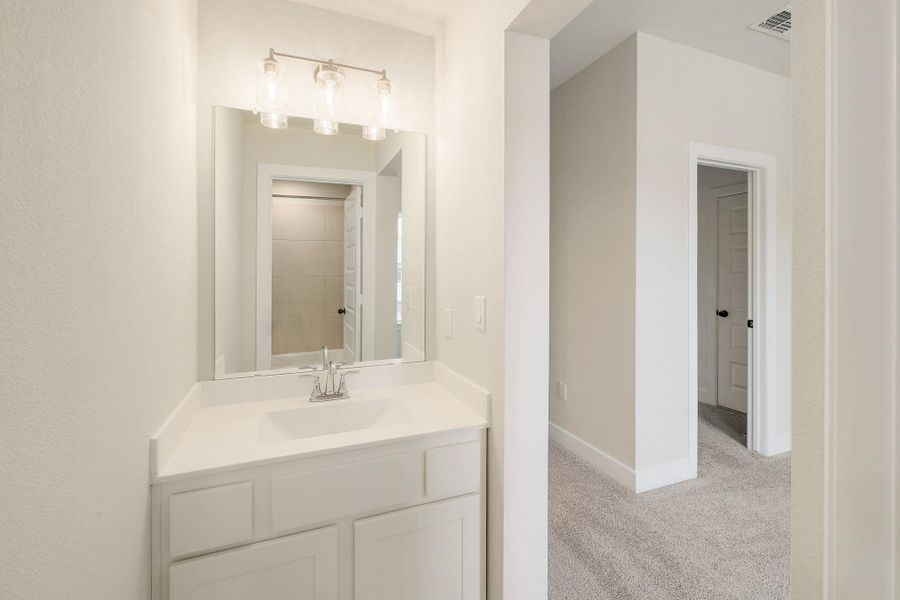 Furnished interior view inside a new home in Parmer Ranch - 60', Georgetown (Image 9).