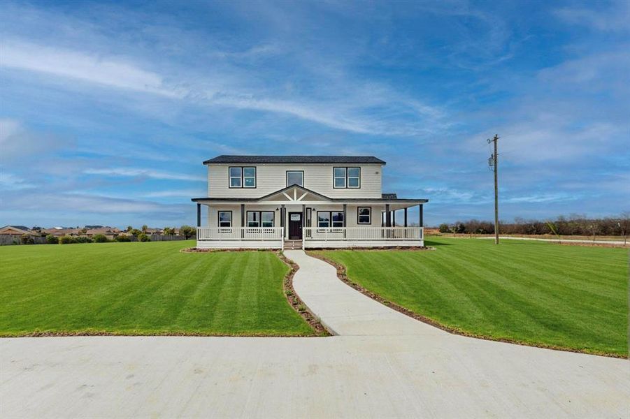 Front exterior of a new home in , Abbott, TX, highlighting curb appeal (Image 28). Front exterior of a new home in , Abbott, TX, highlighting curb appeal (Image 28).