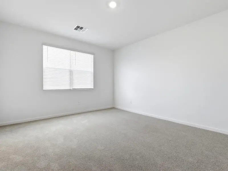 Spacious, unfurnished interior of a new home in Entrada Estate Series, Tolleson (Image 13).