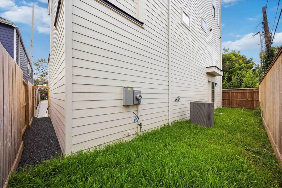 Exterior details and patio area of a home in , Houston (Image 4). Exterior details and patio area of a home in , Houston (Image 4).