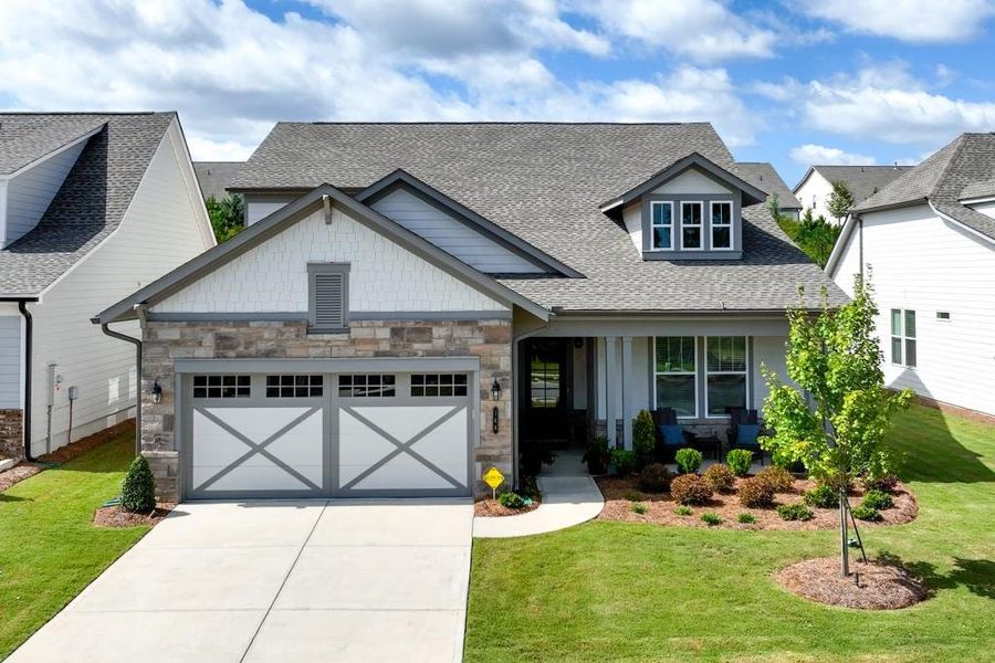 Front exterior of a new home in , Hoschton, GA, highlighting curb appeal (Image 1). Front exterior of a new home in , Hoschton, GA, highlighting curb appeal (Image 1).