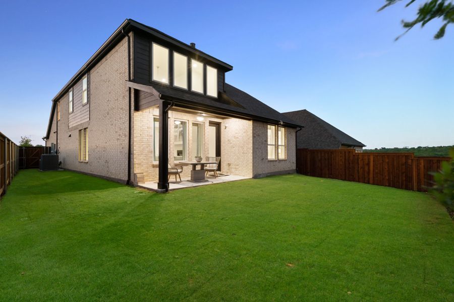 Exterior details and patio area of a home in Reunion, Rhome (Image 20).