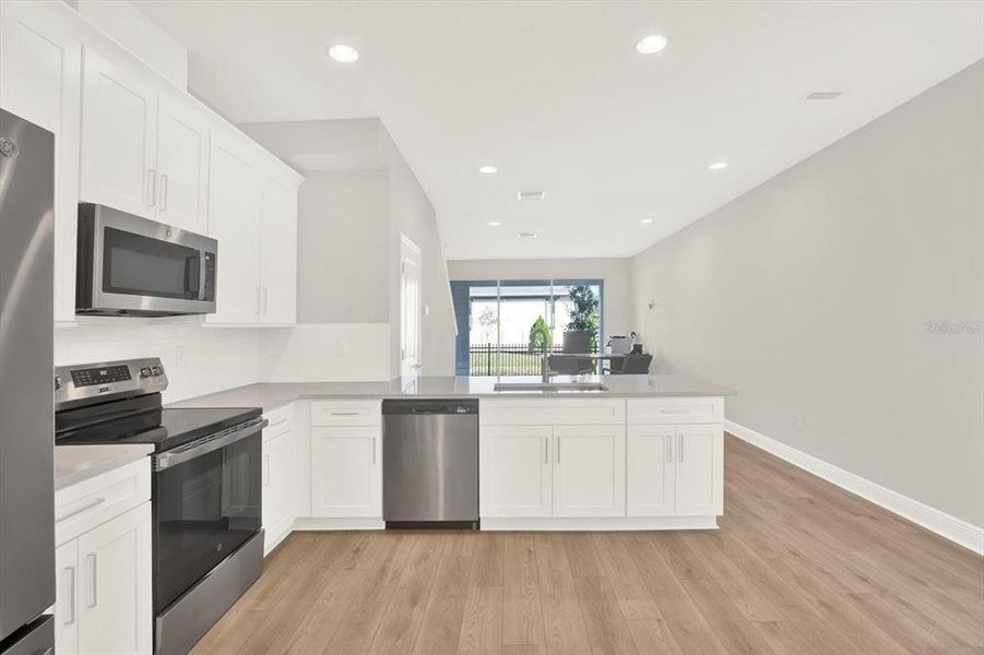 Furnished interior view inside a new home in , Seminole (Image 11).