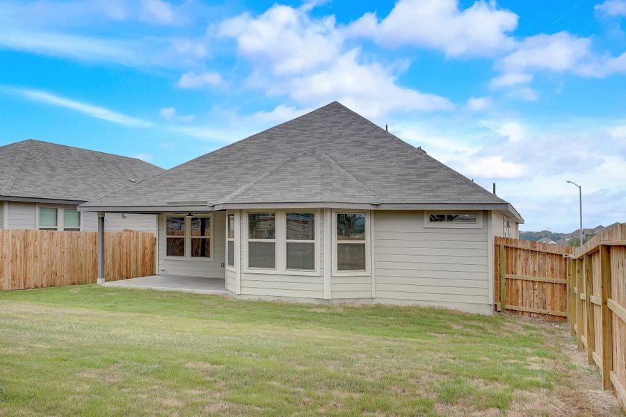 Backyard in the Oleander floorplan at a Meritage Homes community.