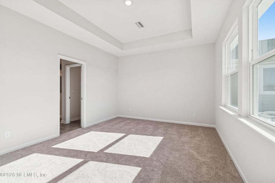 Spacious, unfurnished interior of a new home in Tributary 50', Yulee (Image 26).