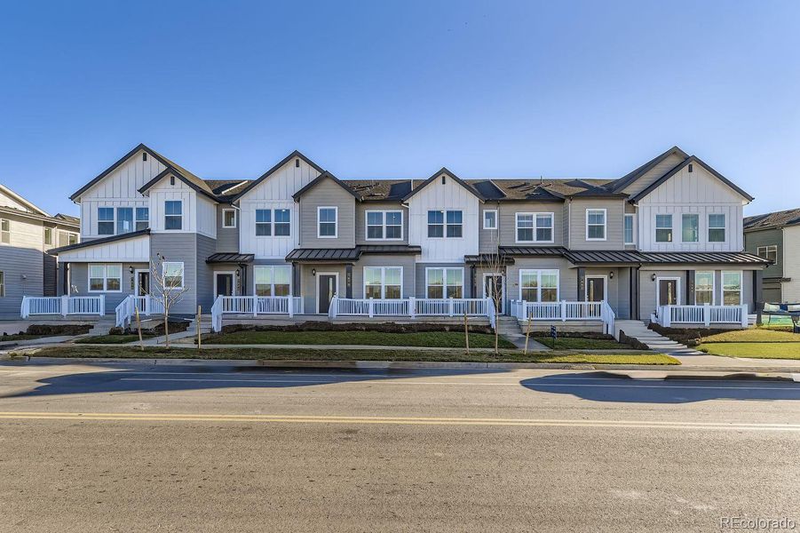 Front exterior of a new home in , Centennial, CO, highlighting curb appeal (Image 1).