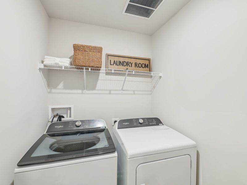 Laundry room in the Jade floorplan at a Meritage Homes community in Mebane, NC. Laundry room in the Jade floorplan at a Meritage Homes community in Mebane, NC.