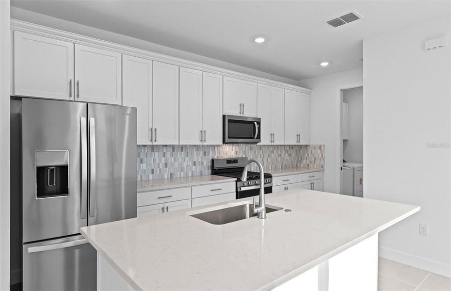 Furnished interior view inside a new home in BeachWalk by Manasota Key, Englewood (Image 7). Furnished interior view inside a new home in BeachWalk by Manasota Key, Englewood (Image 7).
