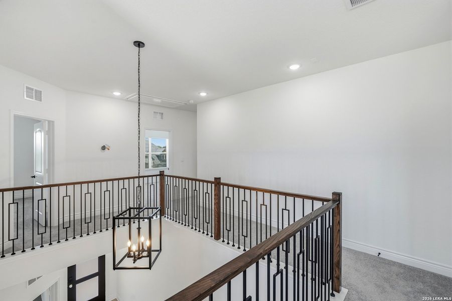 Furnished interior view inside a new home in Bison Ridge, San Antonio (Image 8).