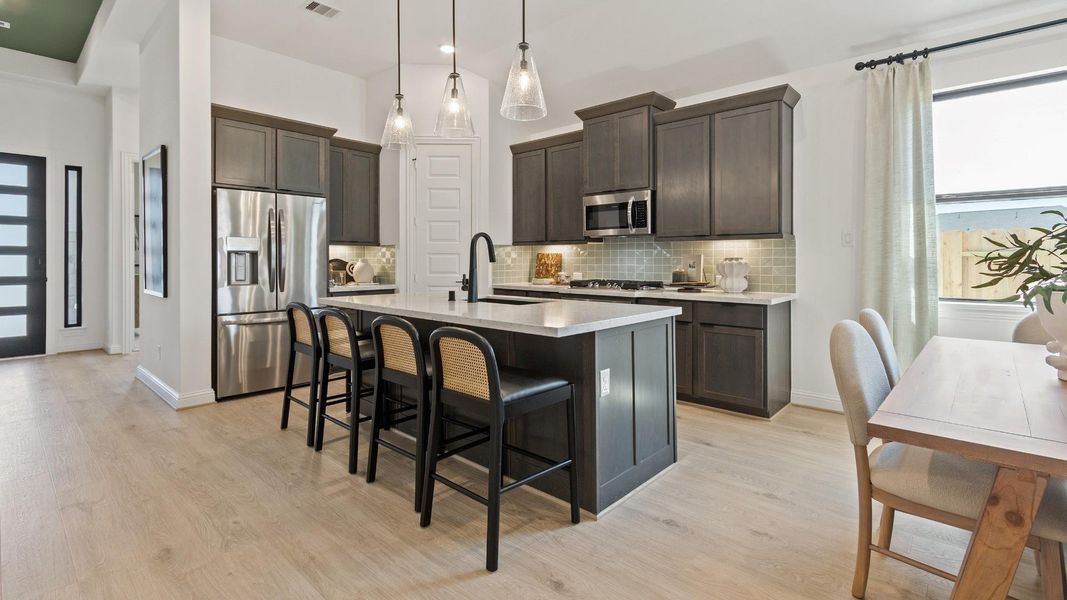 Model home photos of similar floorplans, not pictures of actual home.