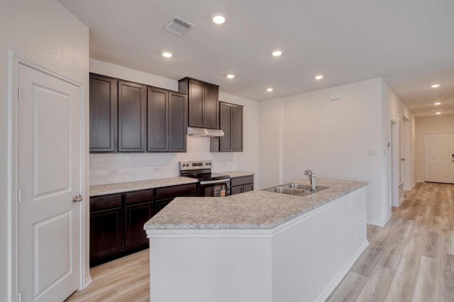 Furnished interior view inside a new home in Sonterra - Cool Water, Jarrell (Image 6).