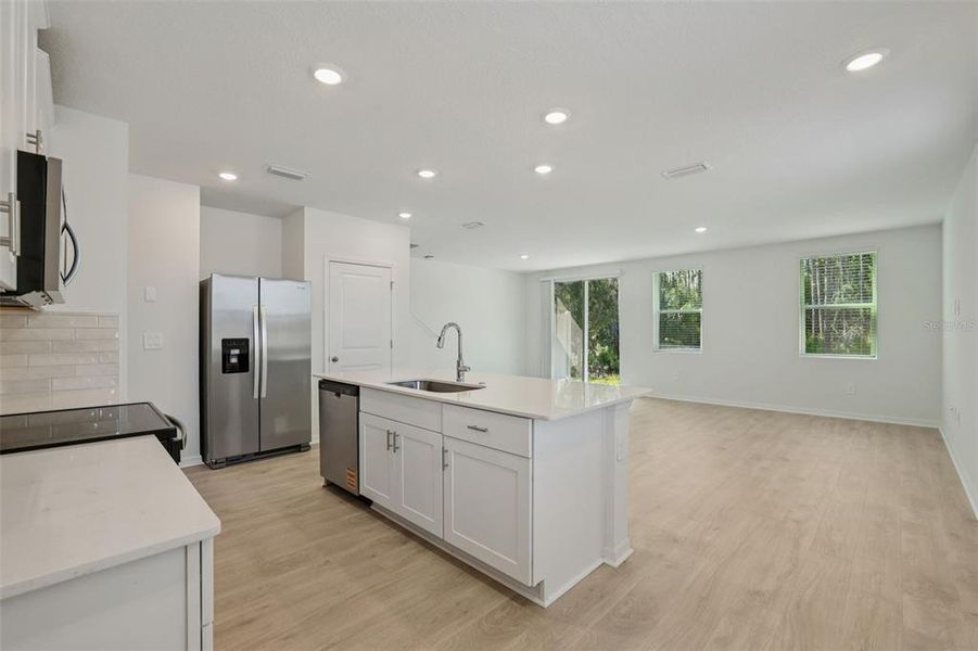 Furnished interior view inside a new home in Bradford Park, Ormond Beach (Image 5).