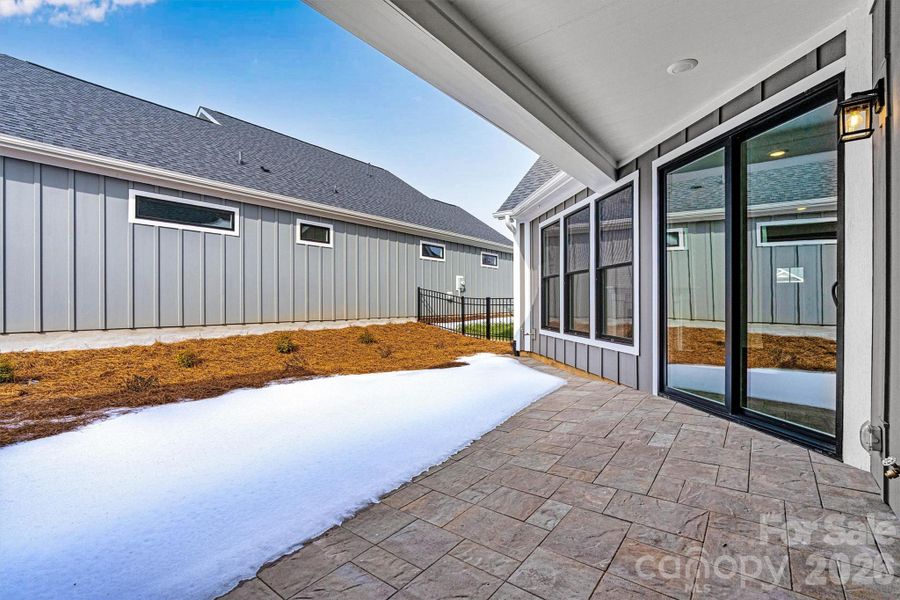 Exterior details and patio area of a home in The Courtyards at Lake Davidson, Mooresville (Image 4).