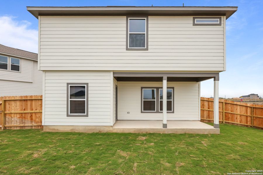 Exterior details and patio area of a home in Garden Grove, Schertz (Image 18).