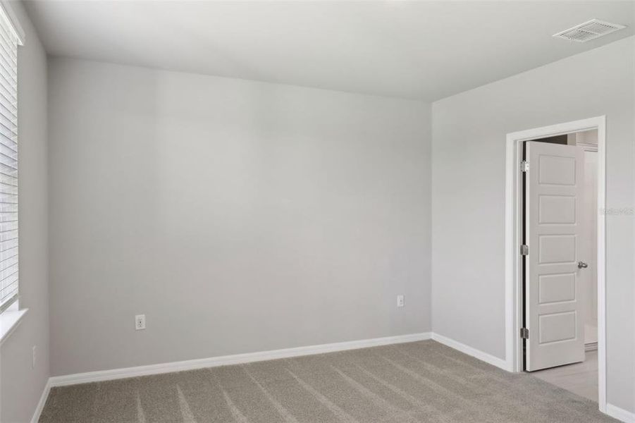 Spacious, unfurnished interior of a new home in Crescent Lakes - Premier Series, Punta Gorda (Image 15). Spacious, unfurnished interior of a new home in Crescent Lakes - Premier Series, Punta Gorda (Image 15).