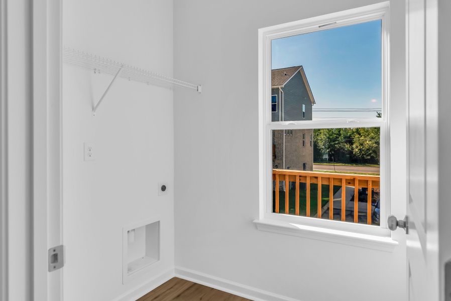 Bright walk in laundry room