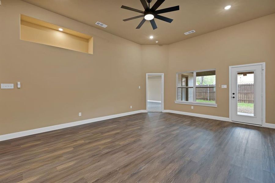 Spare room with recessed lighting, visible vents, baseboards, and ceiling fan Spare room with recessed lighting, visible vents, baseboards, and ceiling fan