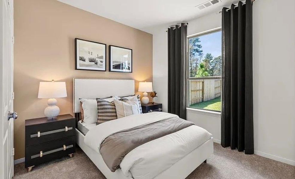 Furnished interior view inside a new home in The Pines At Seven Coves, Willis (Image 8).