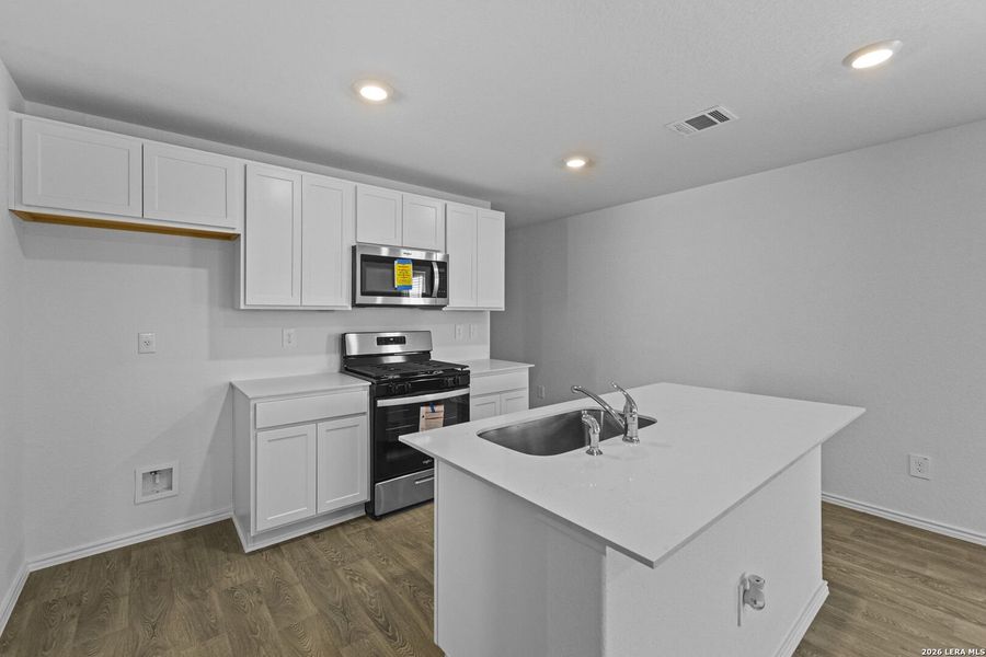 Furnished interior view inside a new home in Hickory Ridge, Elmendorf (Image 12).