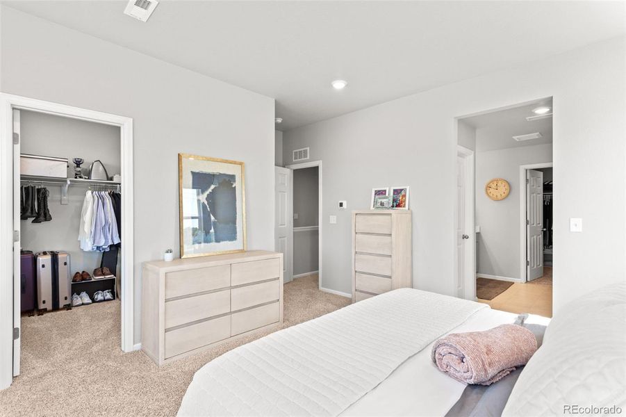 Two closets in primary  bedroom