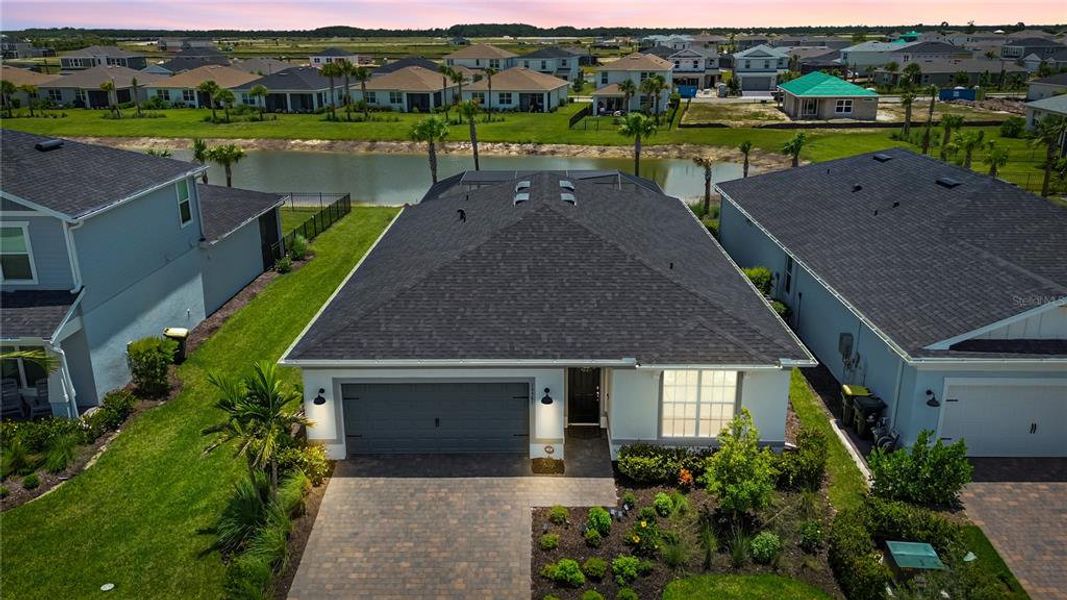 Front exterior of a new home in , Punta Gorda, FL, highlighting curb appeal (Image 2). Front exterior of a new home in , Punta Gorda, FL, highlighting curb appeal (Image 2).