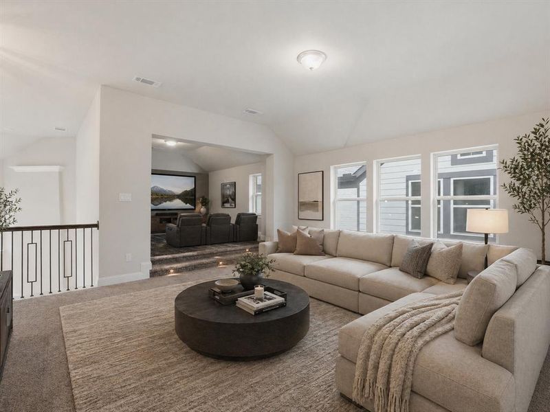 Spacious loft area featuring carpet flooring and multiple windows Spacious loft area featuring carpet flooring and multiple windows