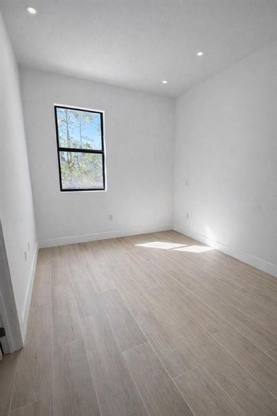 Spacious, unfurnished interior of a new home in , Port Charlotte (Image 9).