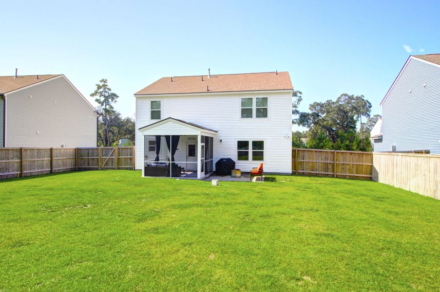 Front exterior of a new home in Sea Island Preserve, Johns Island, SC, highlighting curb appeal (Image 1).